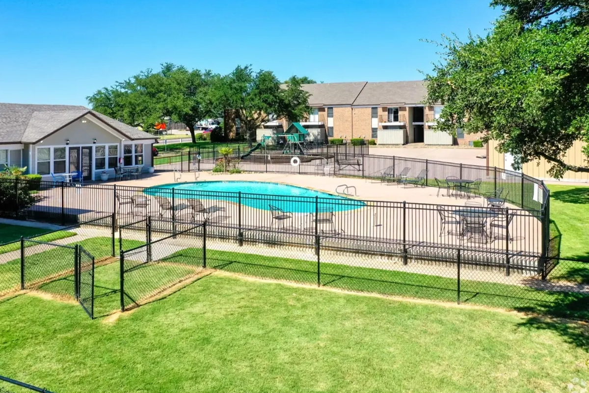 Two-story apartment homes with balconies at Highland Park Apartment Homes